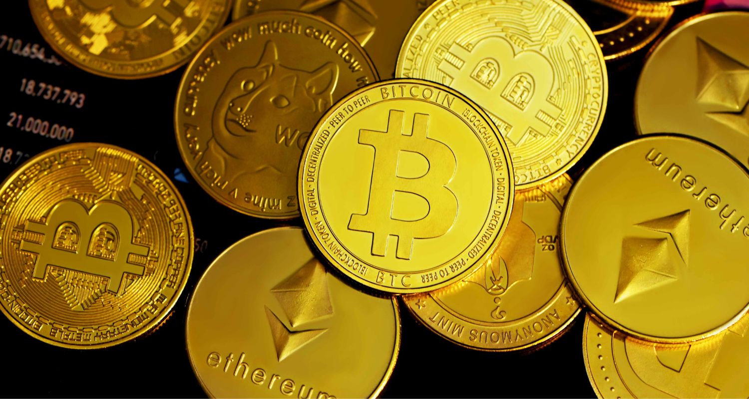 Bitcoin and other cryptocurrencies are featured as actual coins in the image.