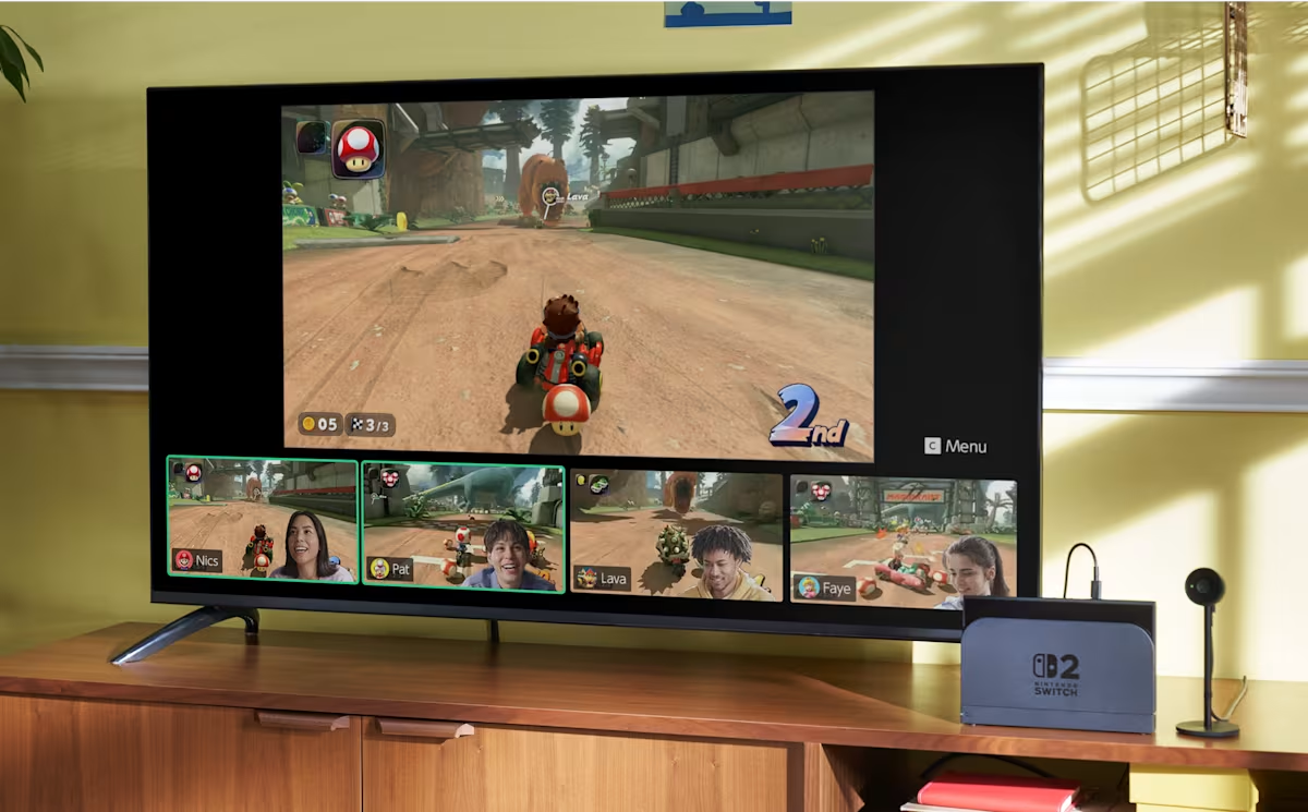 Nintendo Switch 2 GameChat feature on TV screen showing multiplayer gameplay and video chat.
