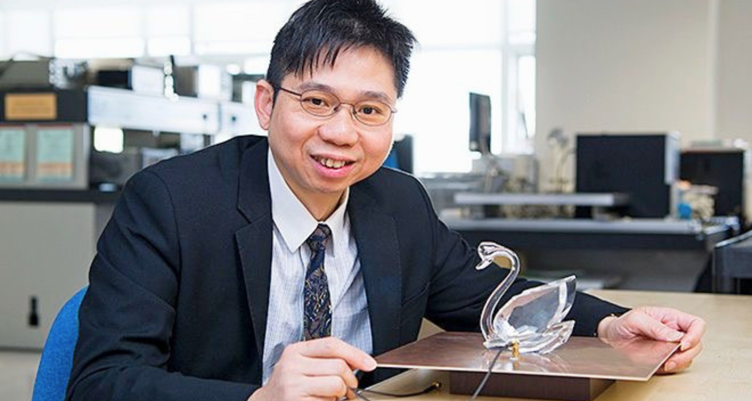 Co-founder, Prof. Leung, with the world's first glass antenna